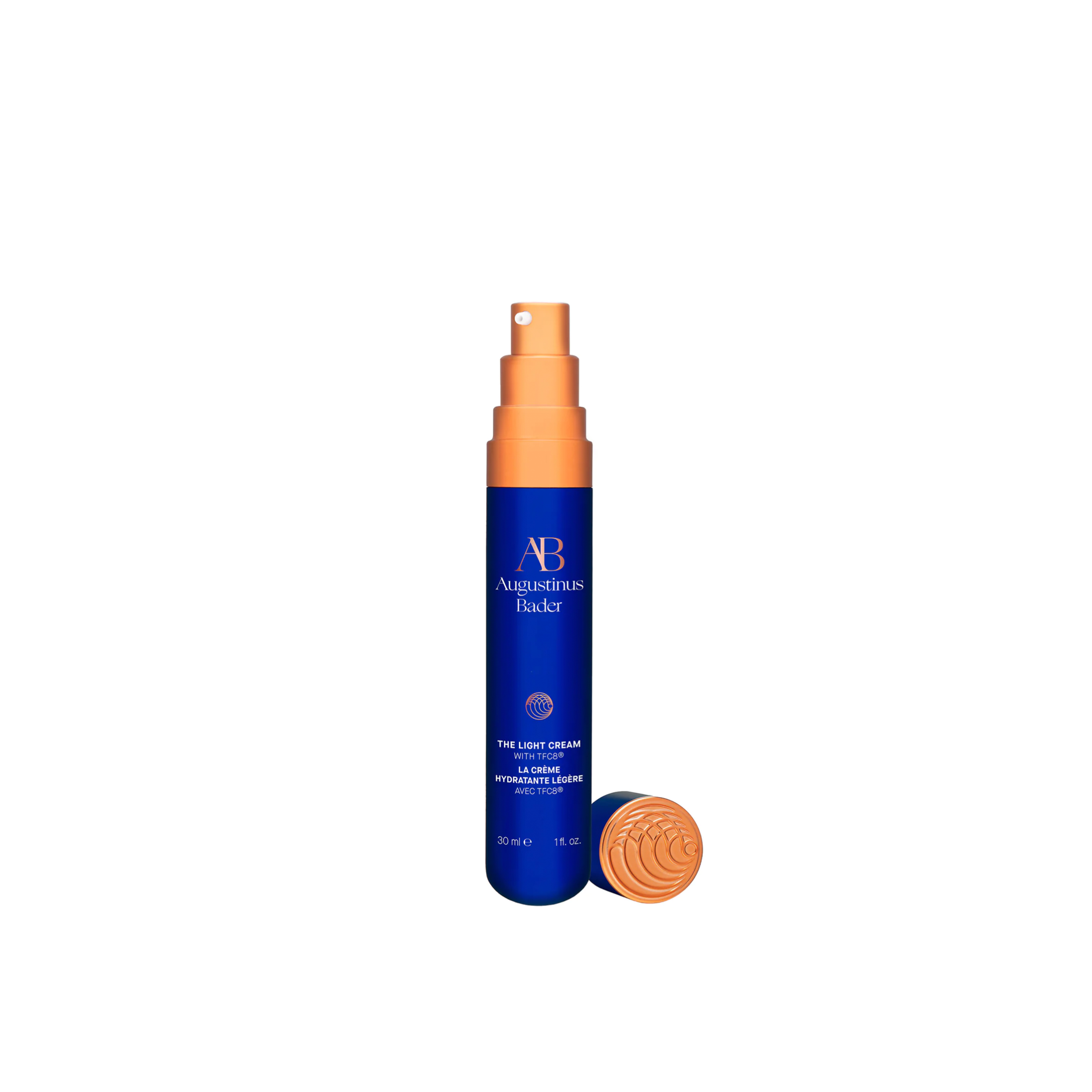 A bottle of Augustinus Bader The Light Cream with the lid off