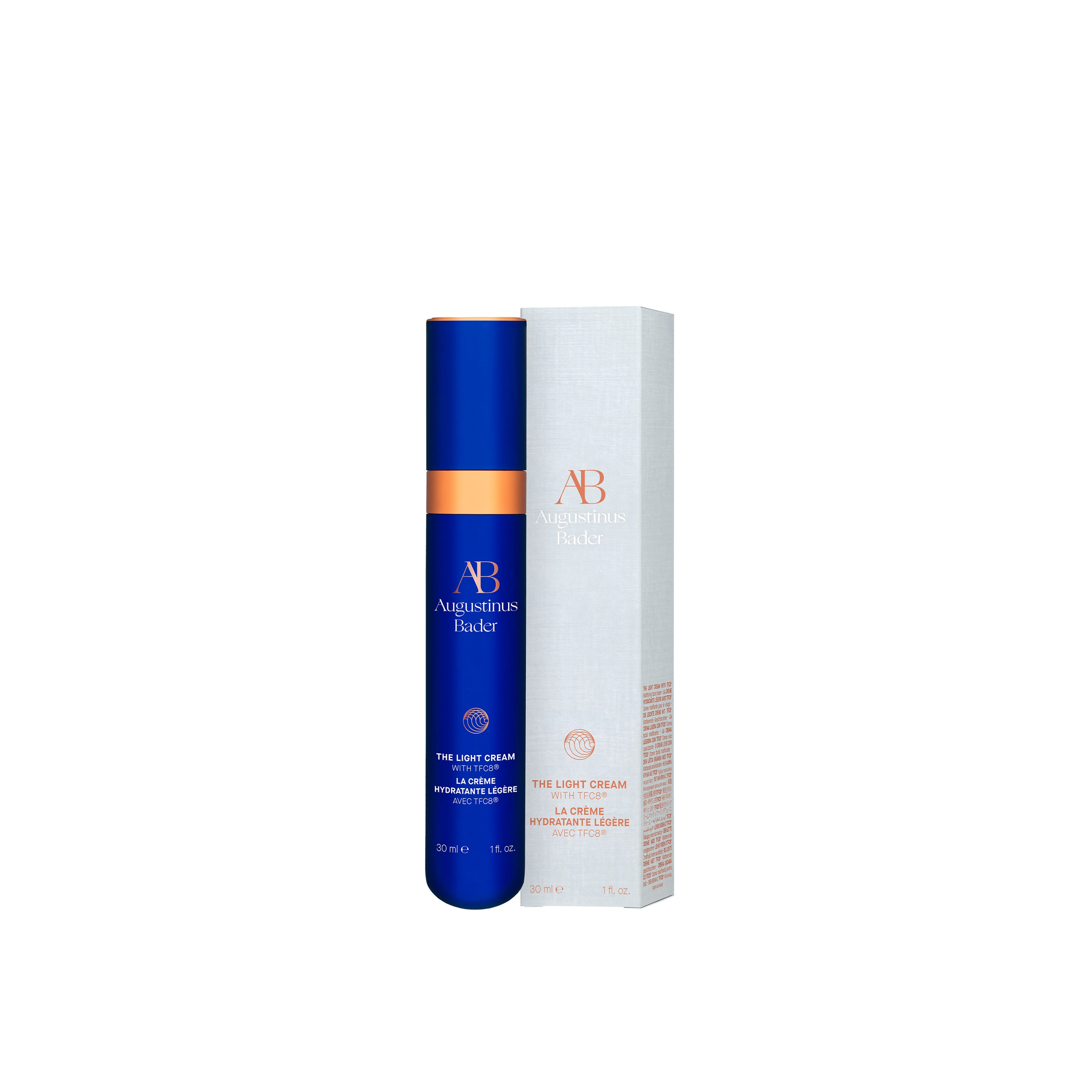 A bottle of Augustinus Bader The Light Cream, shown outside it's box packaging.