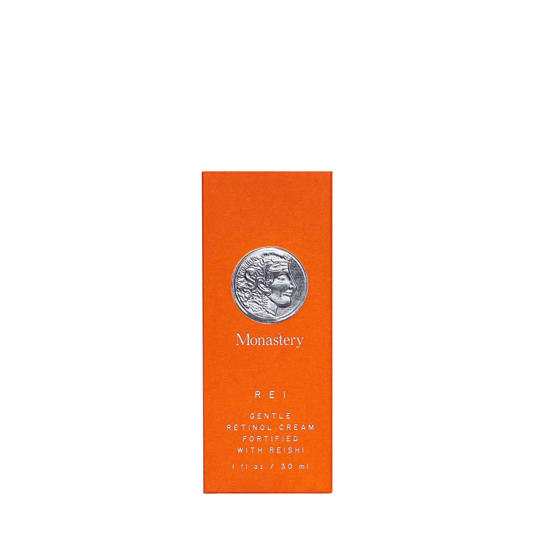 Orange box with silver coin design and 'Monastery' branding on a white background