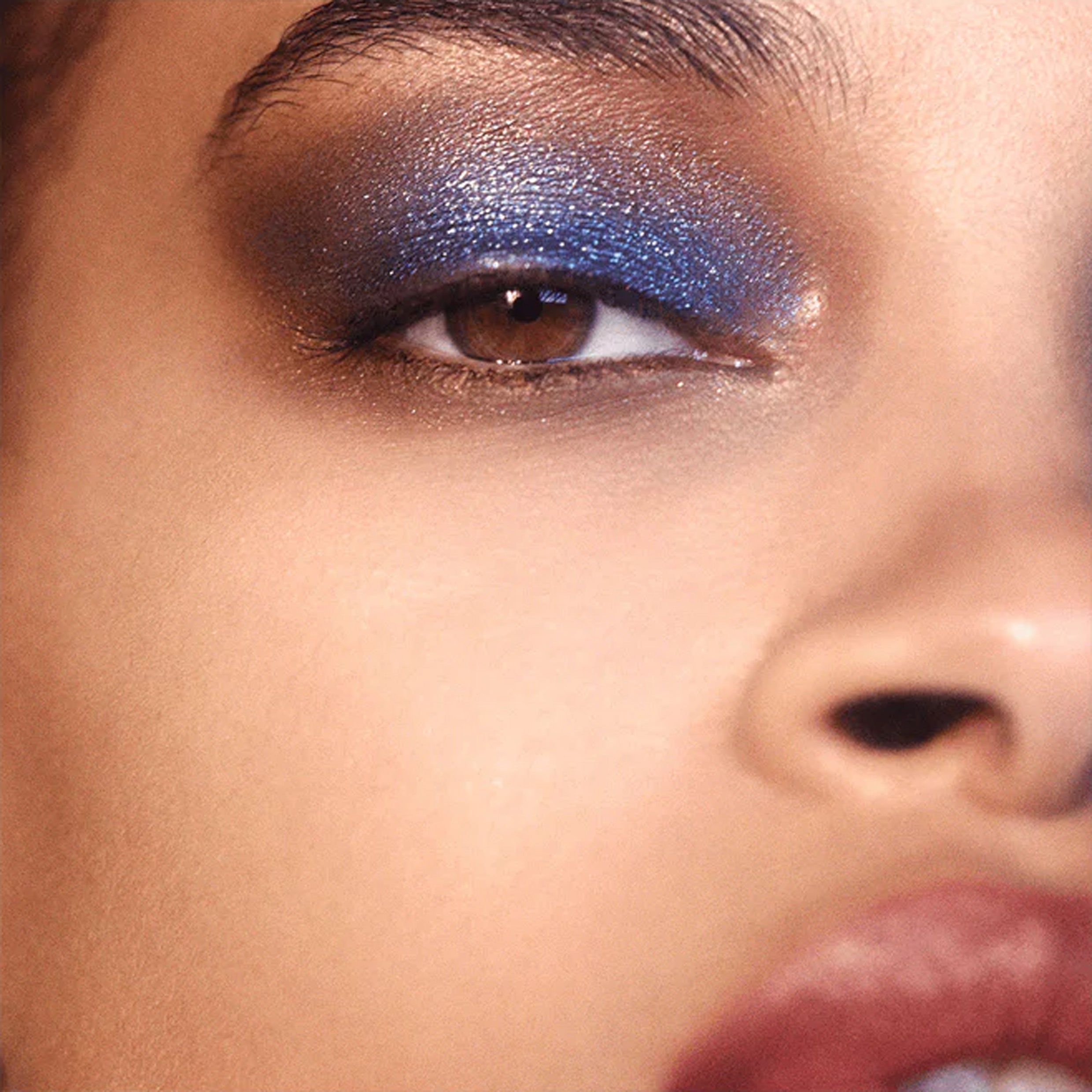 Zoomed in eyelid with blue eyeshadow
