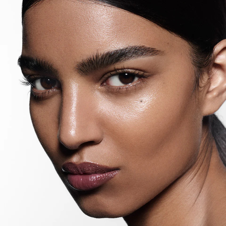 Model wearing Posh Balm in Cassis