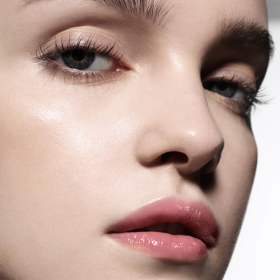Close up photo of model wearing Posh Balm in Fleur