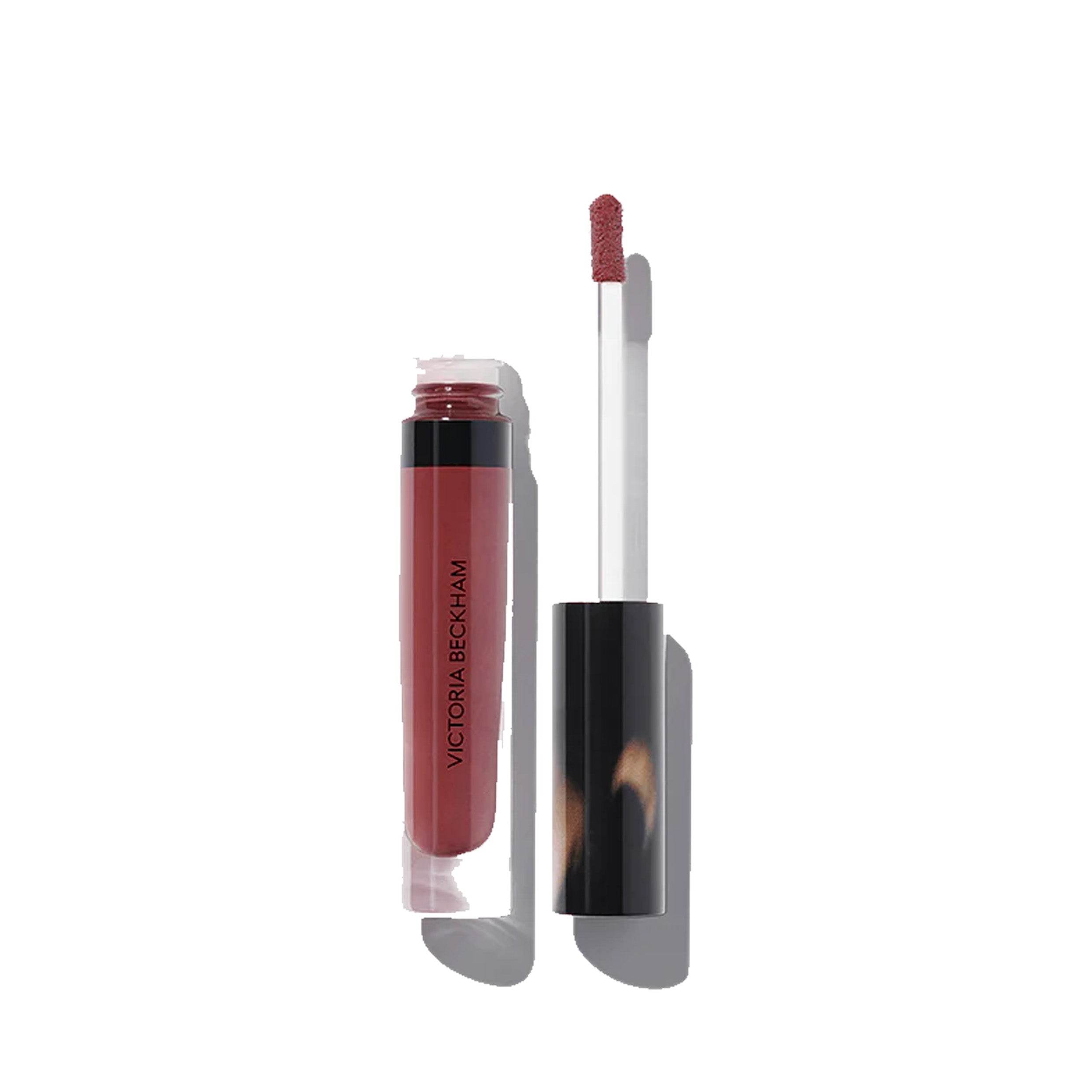 An open tube of Victoria Beckham Beauty Posh Gloss in Aperitivo