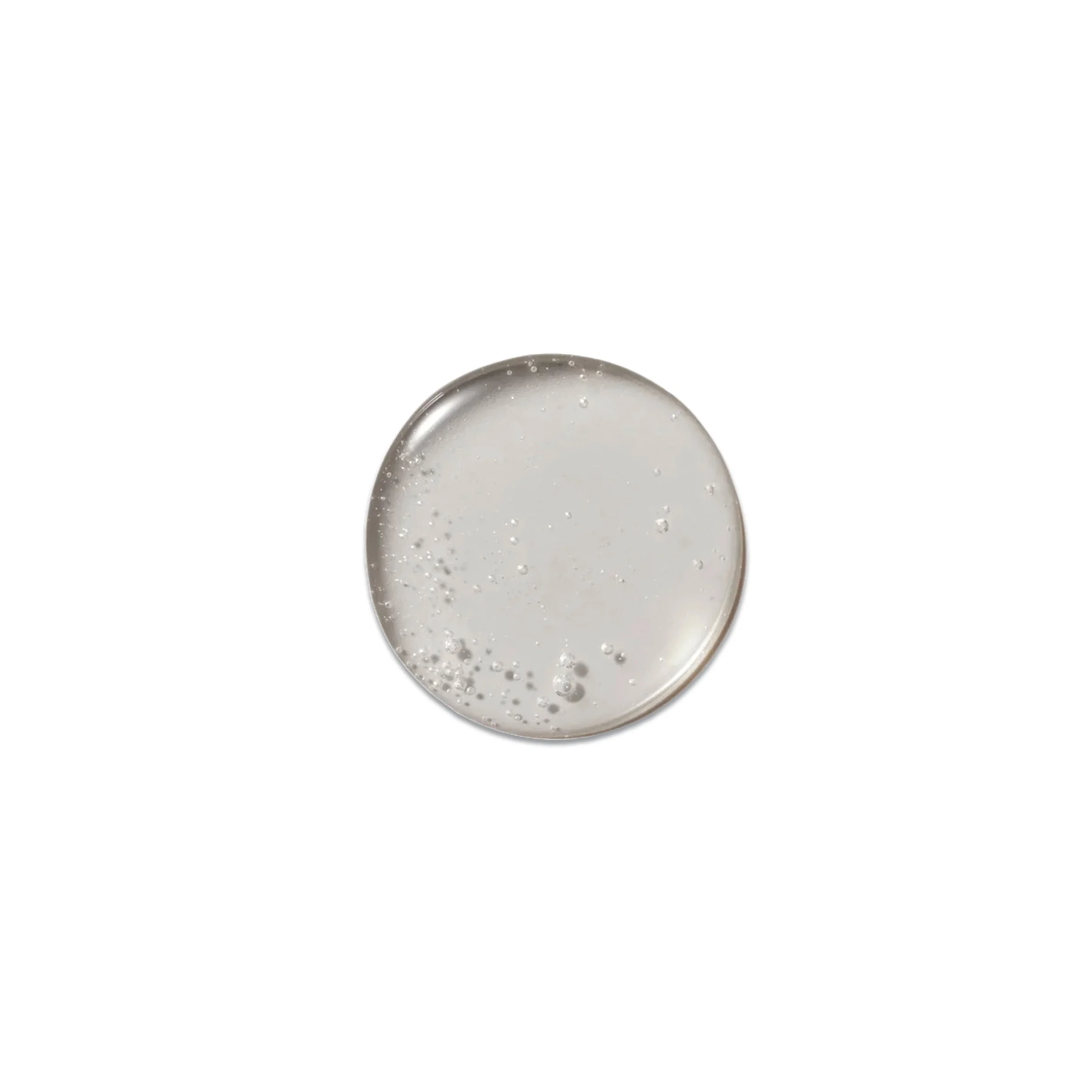 A product sample of Victoria Beckham Beauty Oil Cleanser, showing an oily texture.