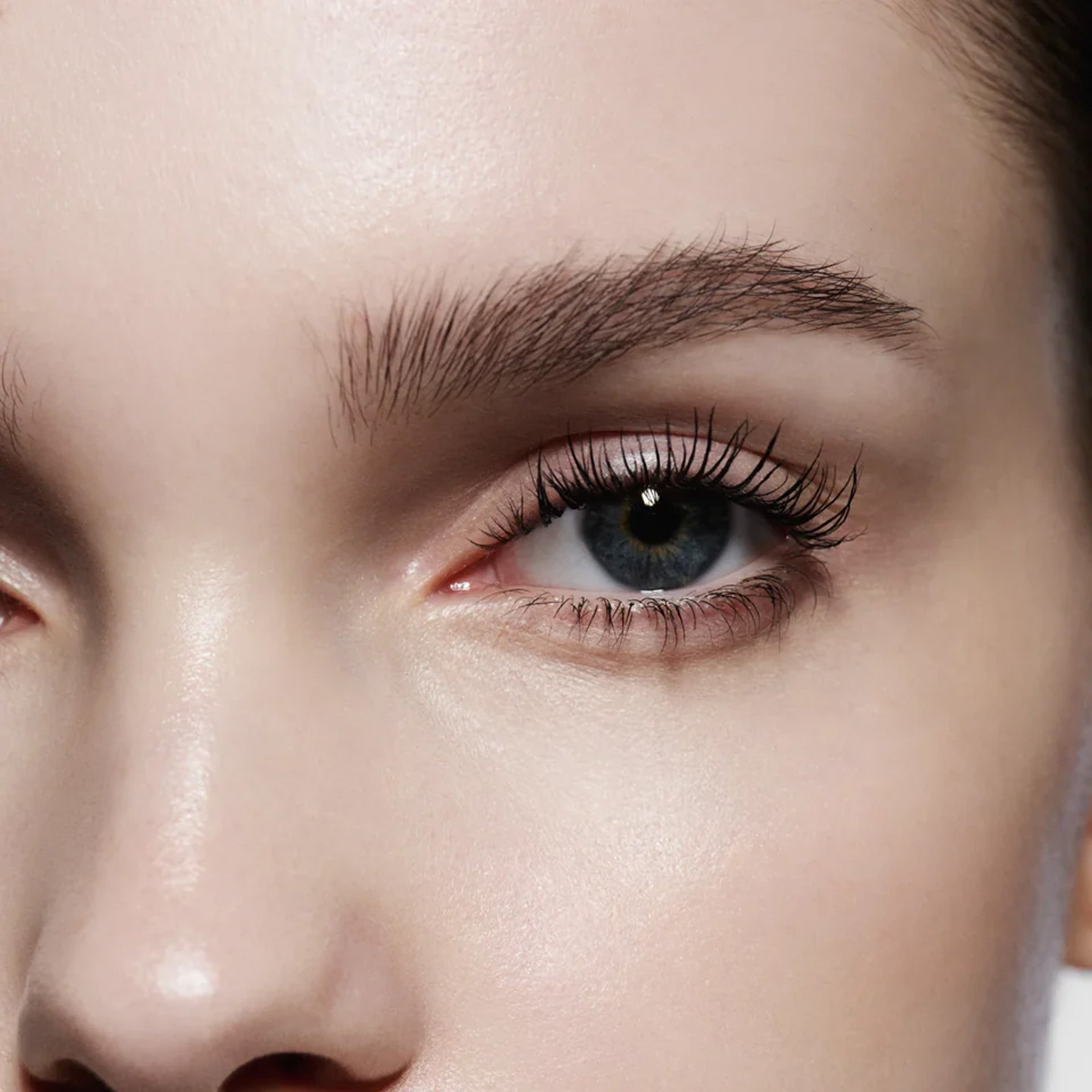 Close up image of model wearing Mascara