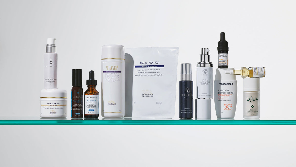 Skincare products arranged on a glass shelf from the Pigmentation & Dark Spots photography archive