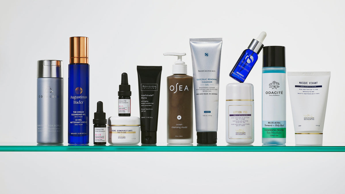 Skincare products arranged on a glass shelf from the Blemish Prone photography archive
