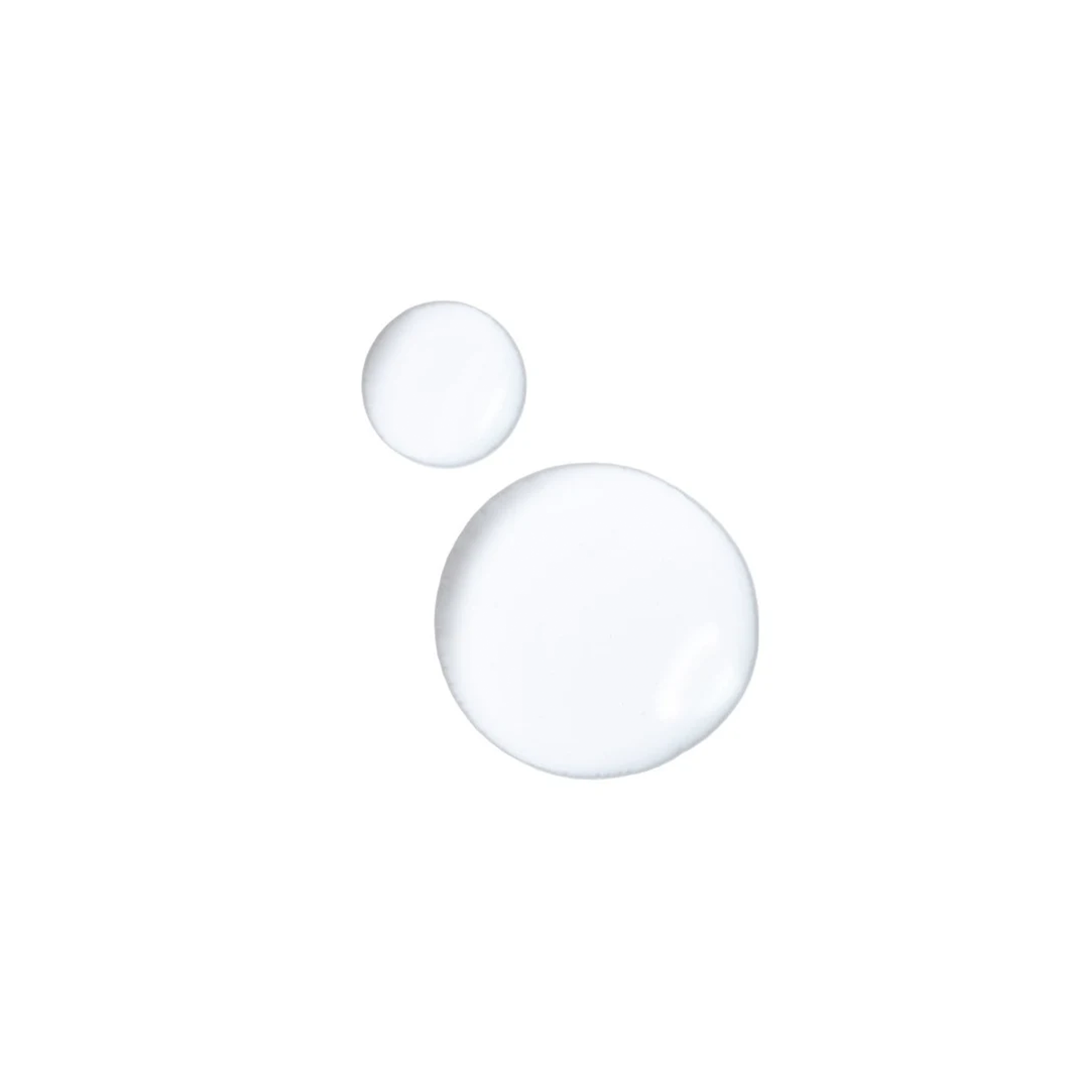 Two droplets of a facial essence on a plain product