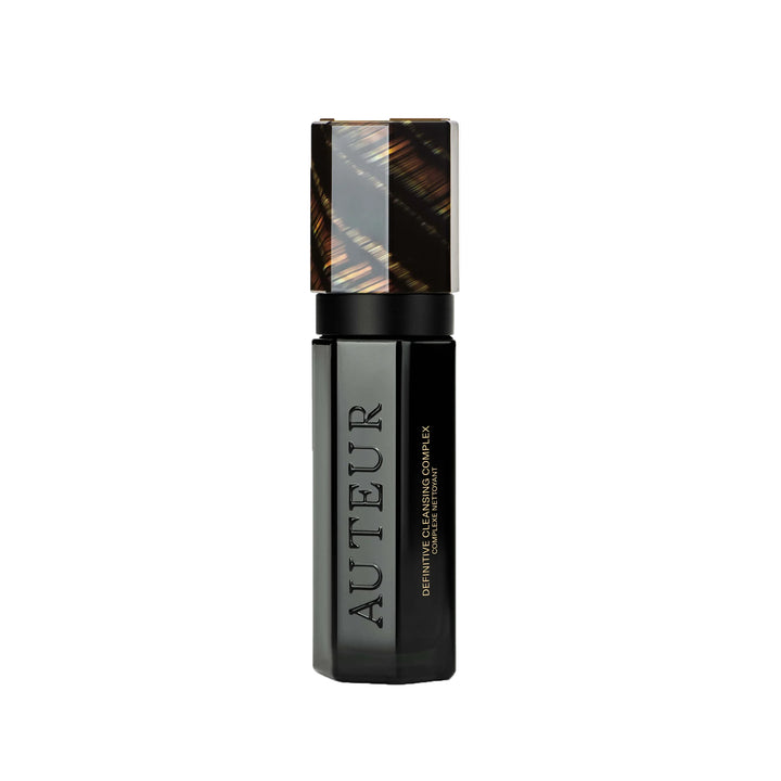 Black skincare bottle with 'Auteur' branding on a white background