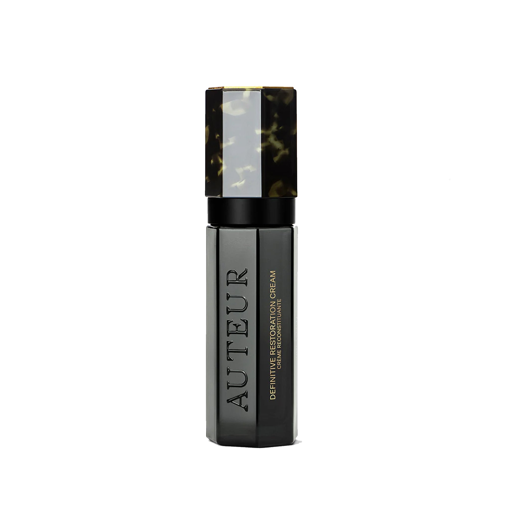 A black pump bottle with gold accents, labeled Auteur Definitive Restoration Cream.