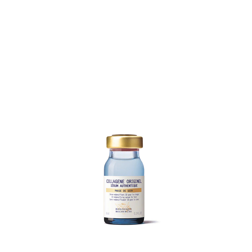 Vial with a gold cap on a white background