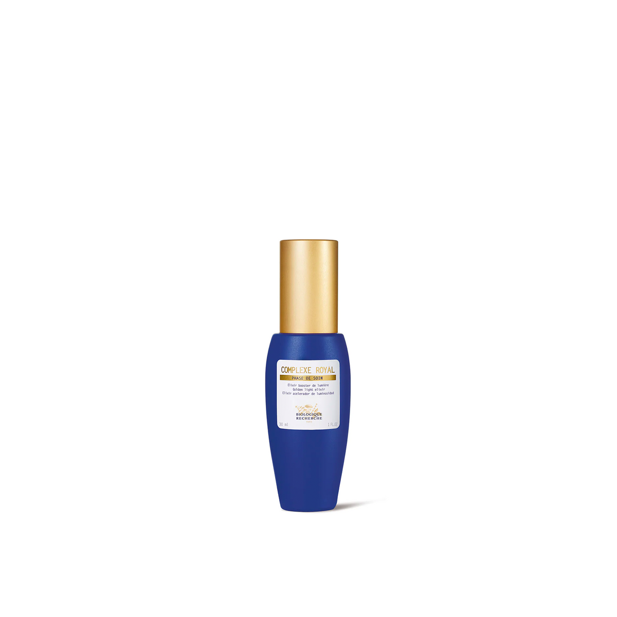 A blue bottle with a gold cap labeled Biologique Recherche Complexe Royal.