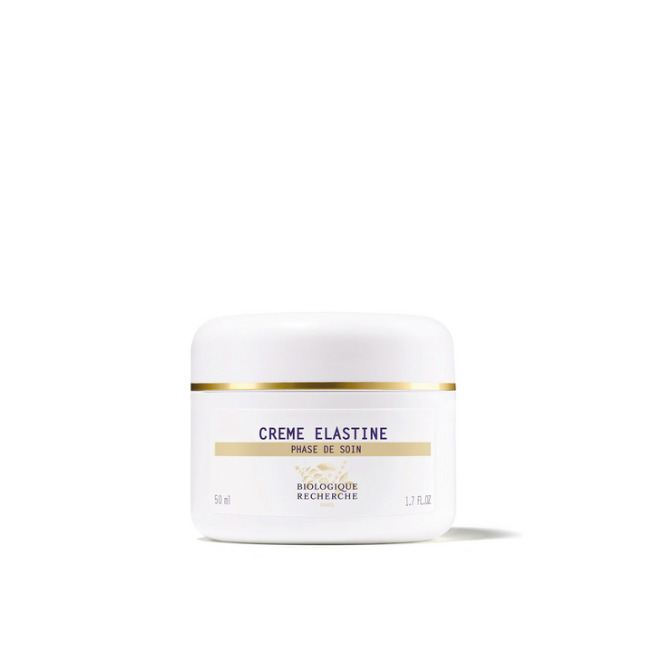 A white jar of Biologique Recherche Crème Elastine with black and gold text, indicating the product is for the face and contains 50ml of the cream.