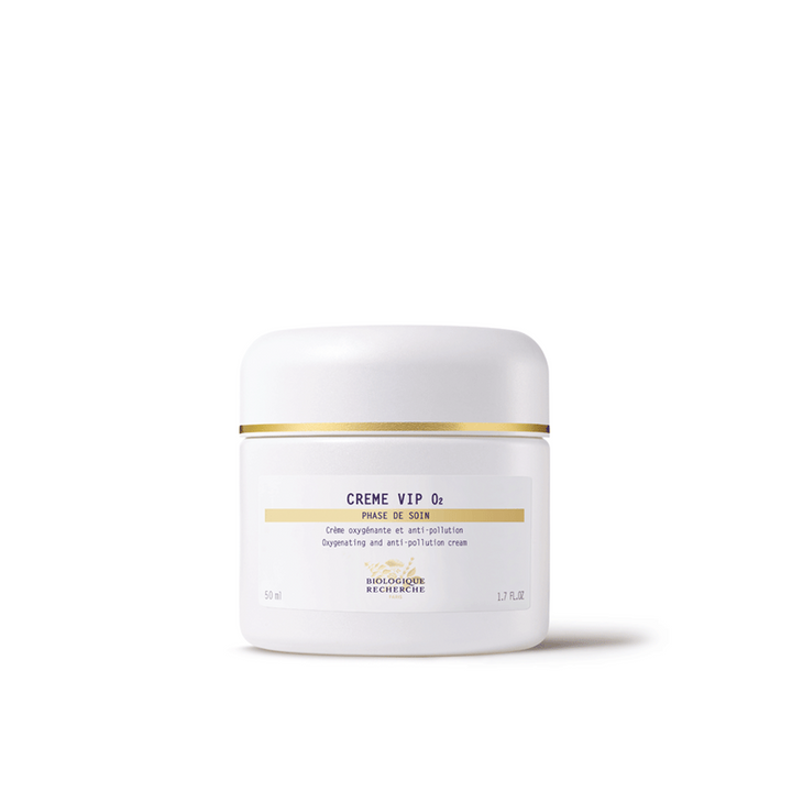 A white jar of Biologique Recherche Crème VIP O2 with black and gold text, indicating it is a hydrating and brightening cream for the face.