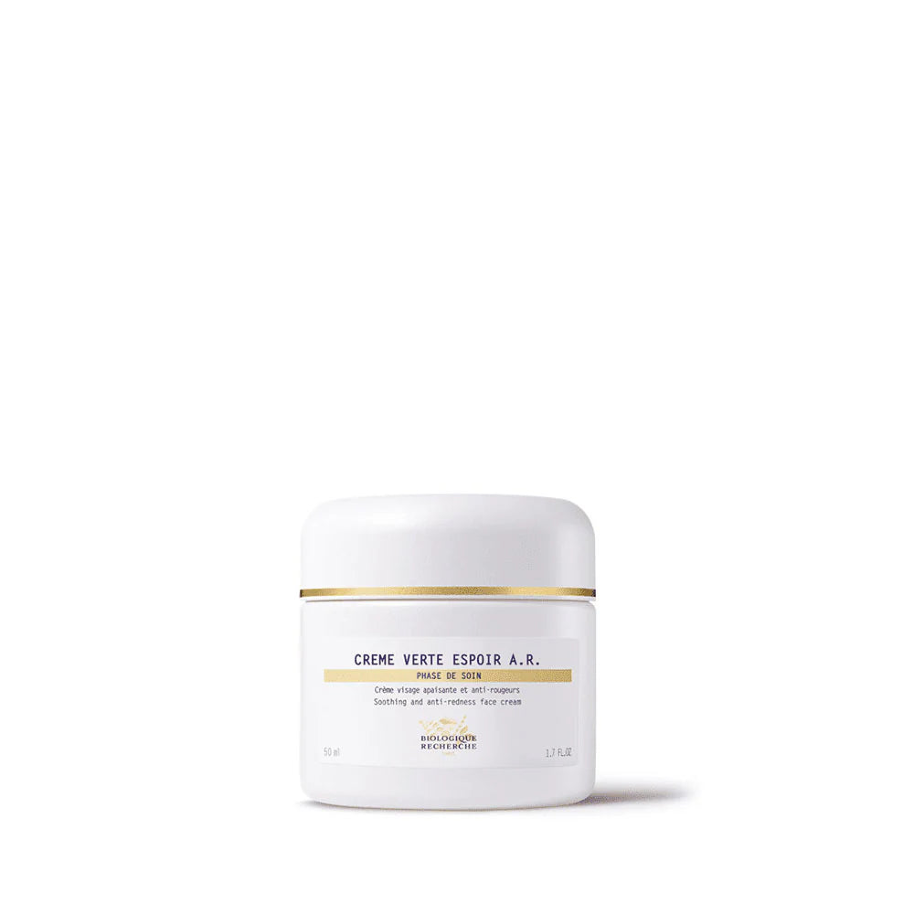 White jar with gold band on a white background