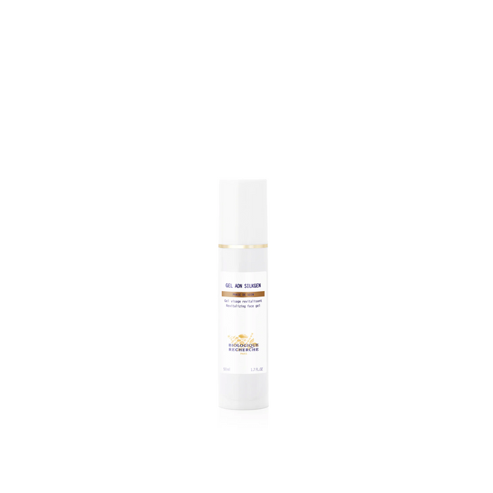 A white bottle of Biologique Recherche Gel ADN Silkgen with product information printed on it