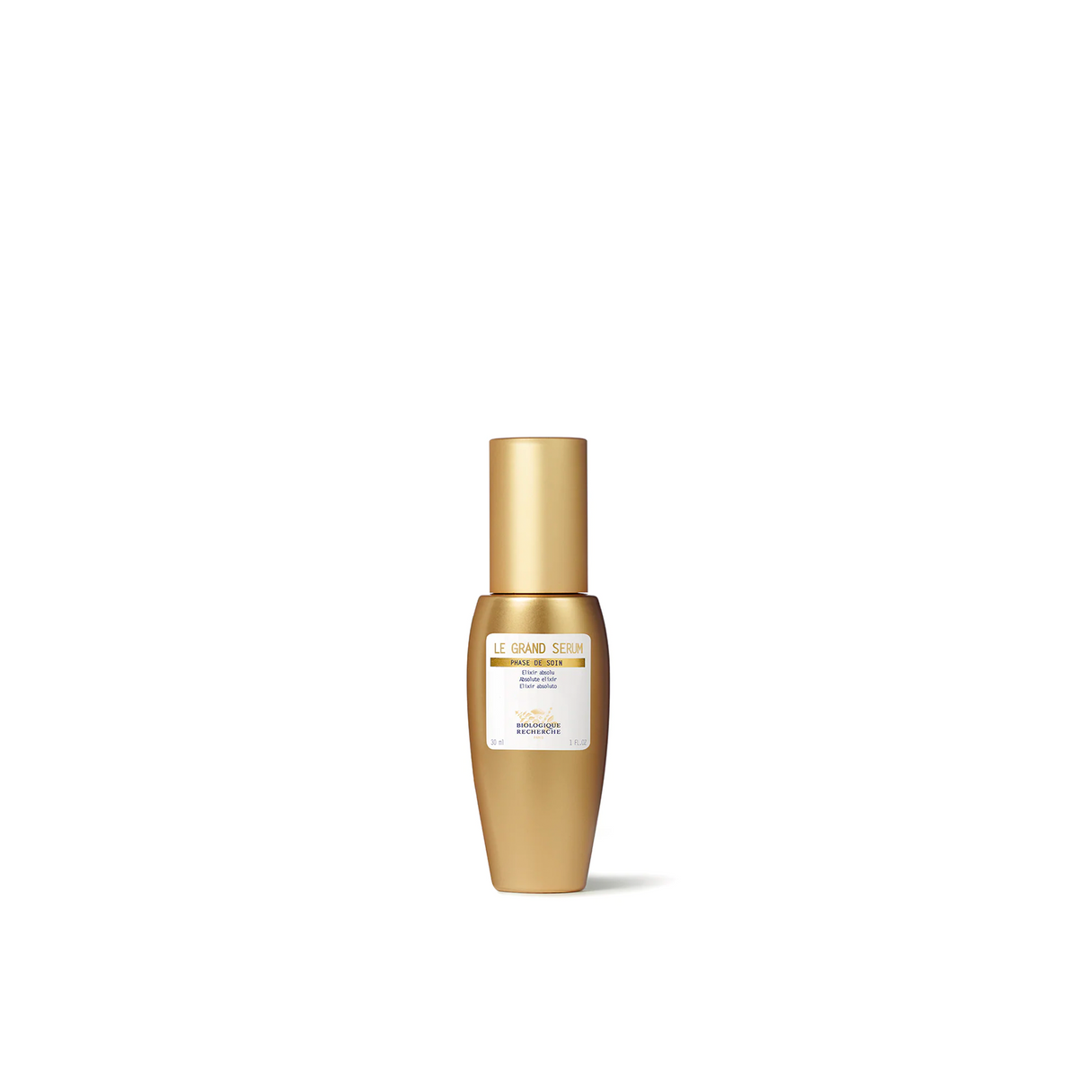 A golden glass bottle of Biologique Recherche Le Grand Serum with a white label.