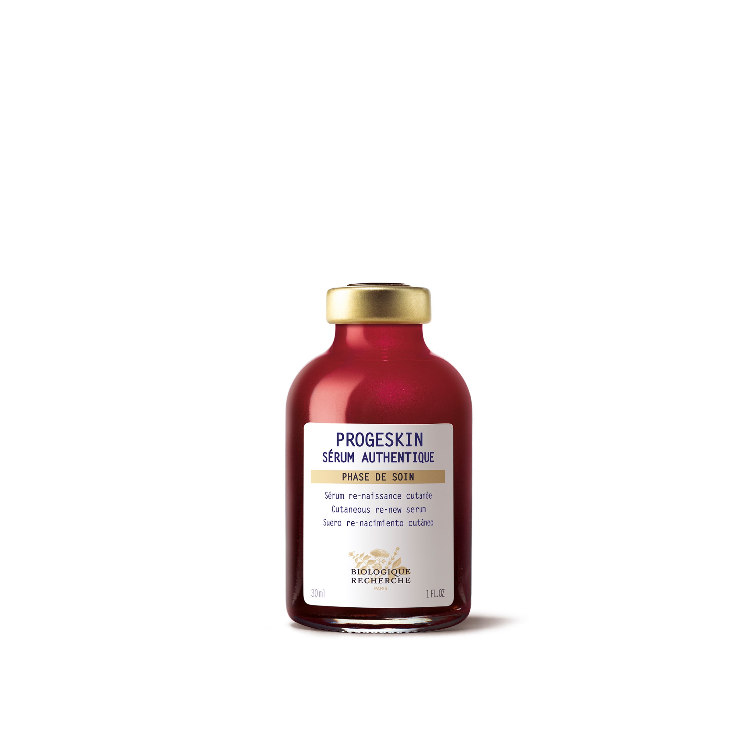 A red glass vial with a gold cap labeled 'PROGESKIN SÉRÈUM AUTHENTIQUE' which contains the Biologique Recherche Progeskin Serum.