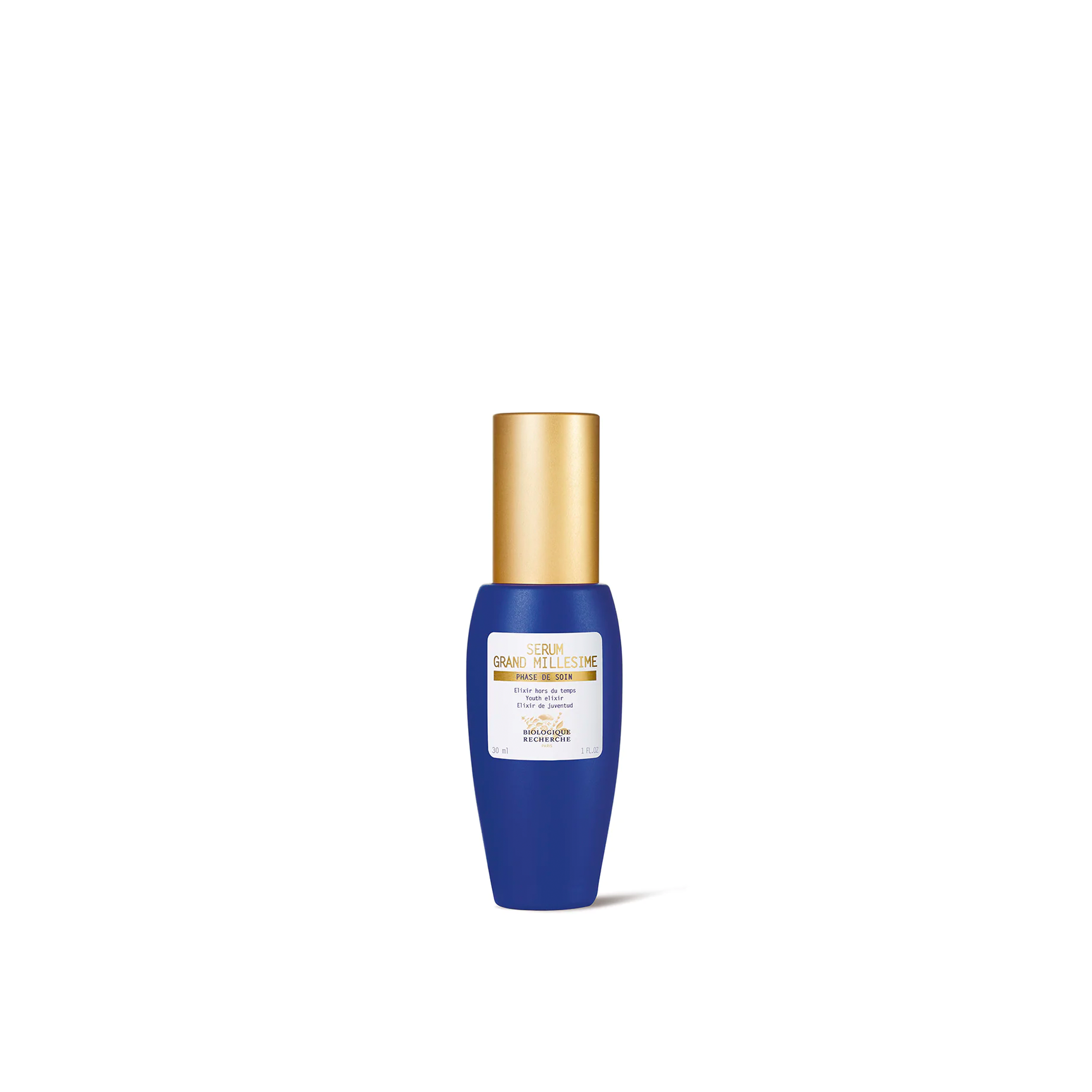 A bottle of Biologique Recherche Serum Grand Milliesime with a blue body and a gold cap.