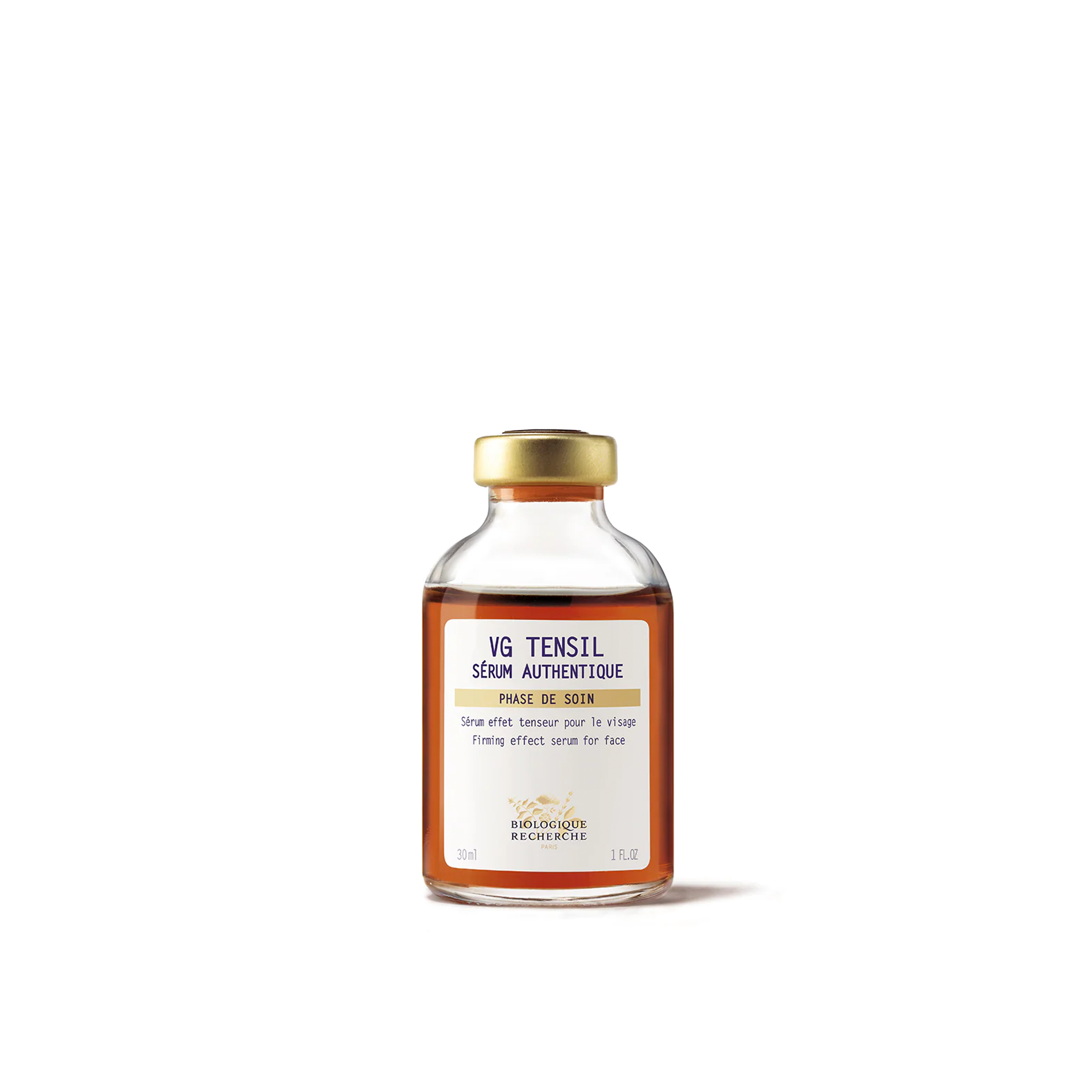 A glass bottle containing a liquid labeled 'VG Tensil', which is a face serum product.