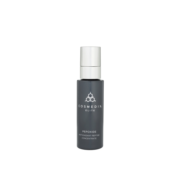A bottle of Cosmedix Elite Pepoxide serum against a white background.
