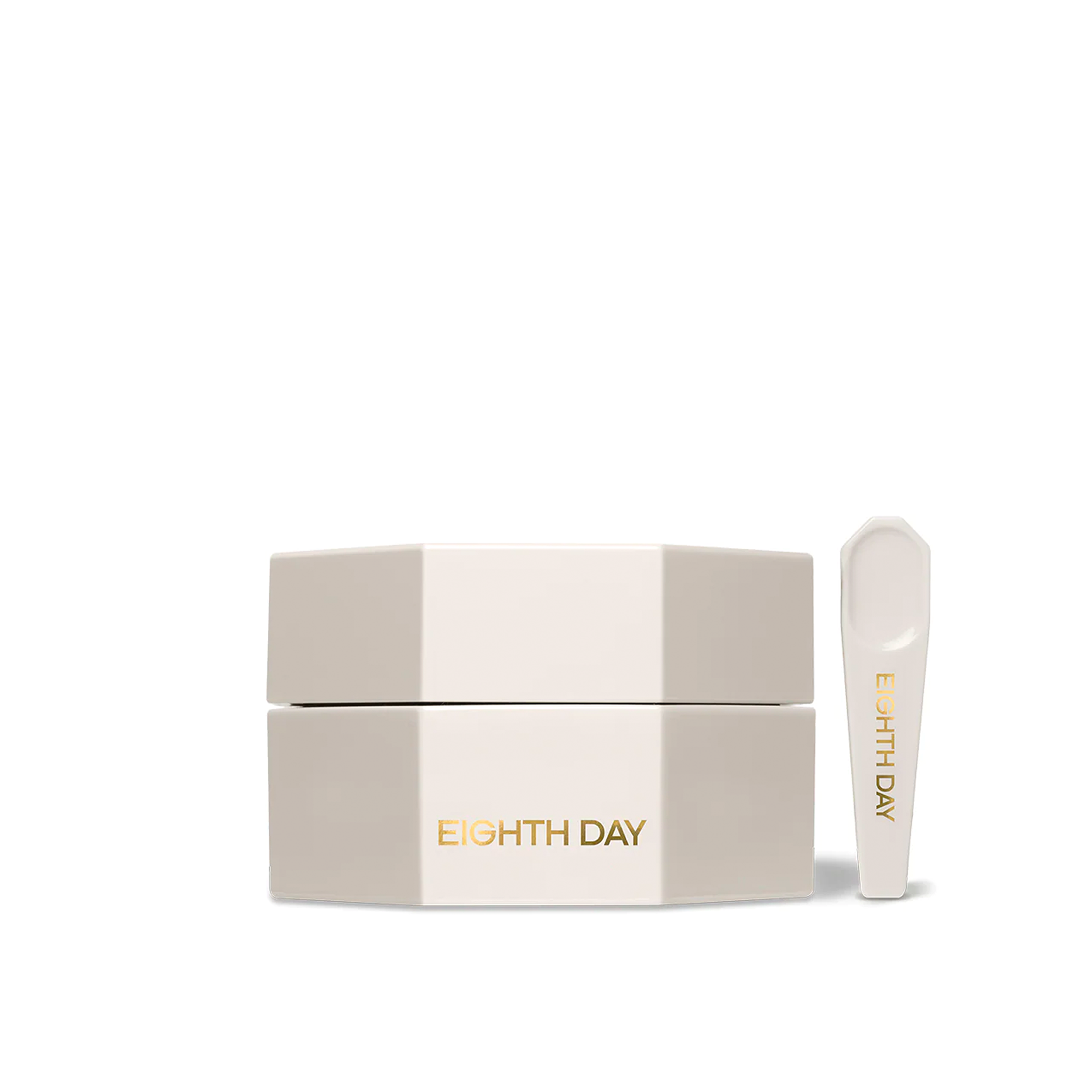 A white jar with a lid and a spoon applicator both labeled with 'EIGHTH DAY' against a neutral background.