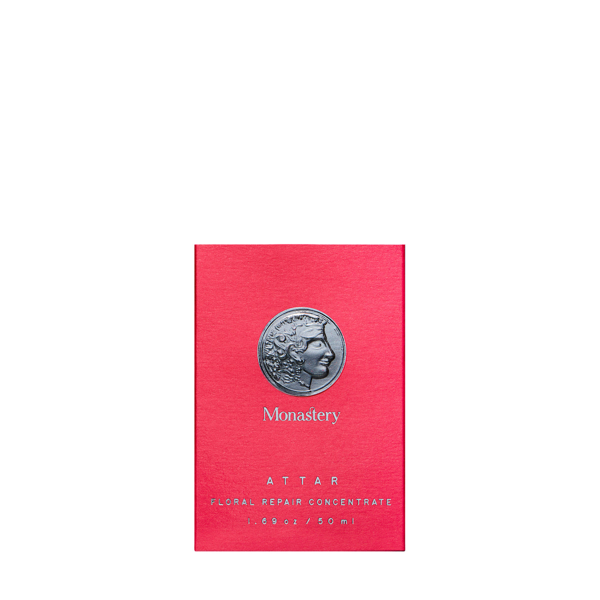 Pink packaging of Monastery Attar with a silver coin design on a white background