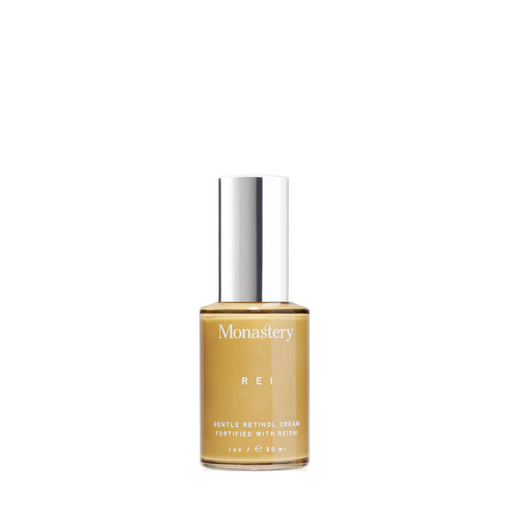 Skincare bottle labeled 'Monastery REI' on a white background