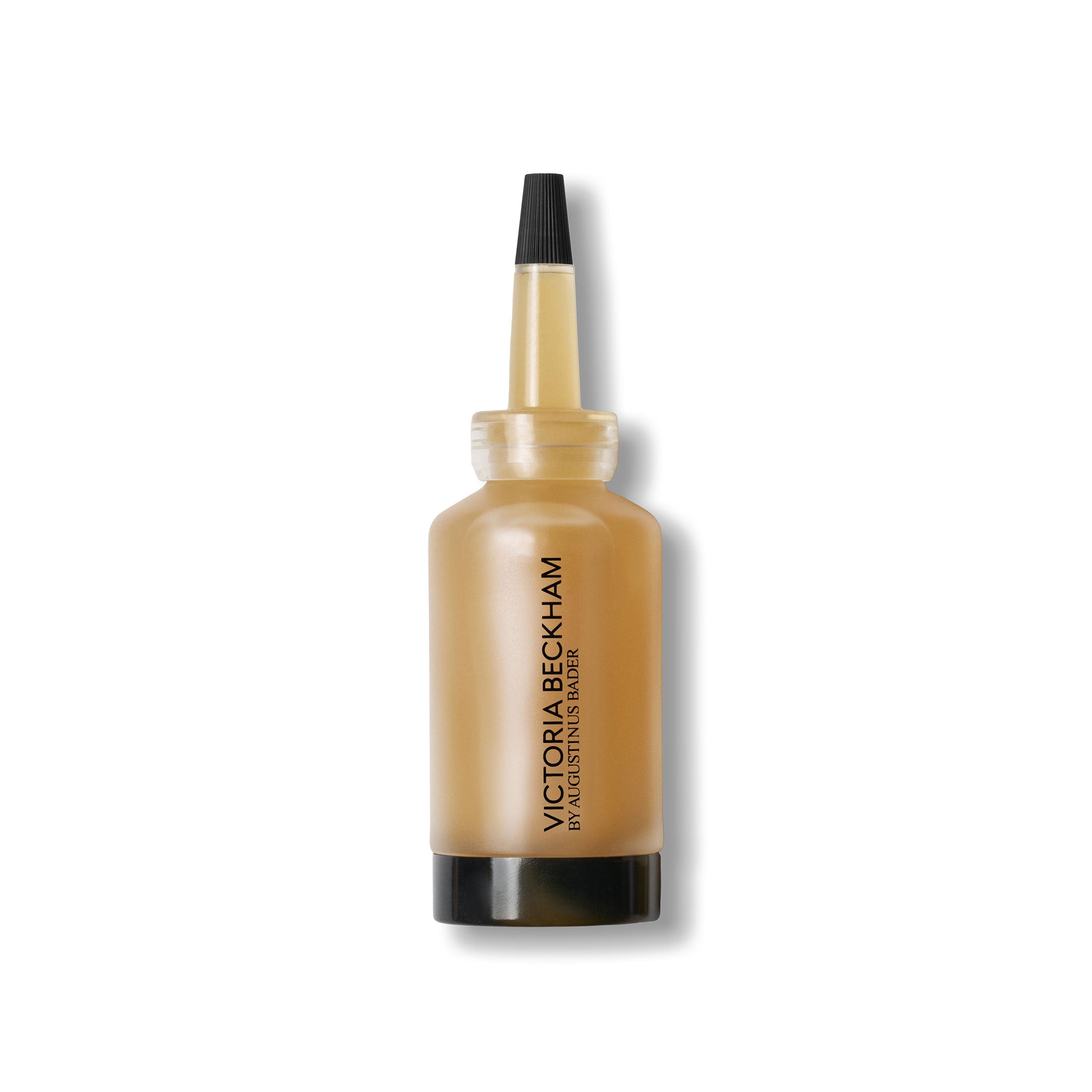 Victoria Beckham Serum bottle on a white background