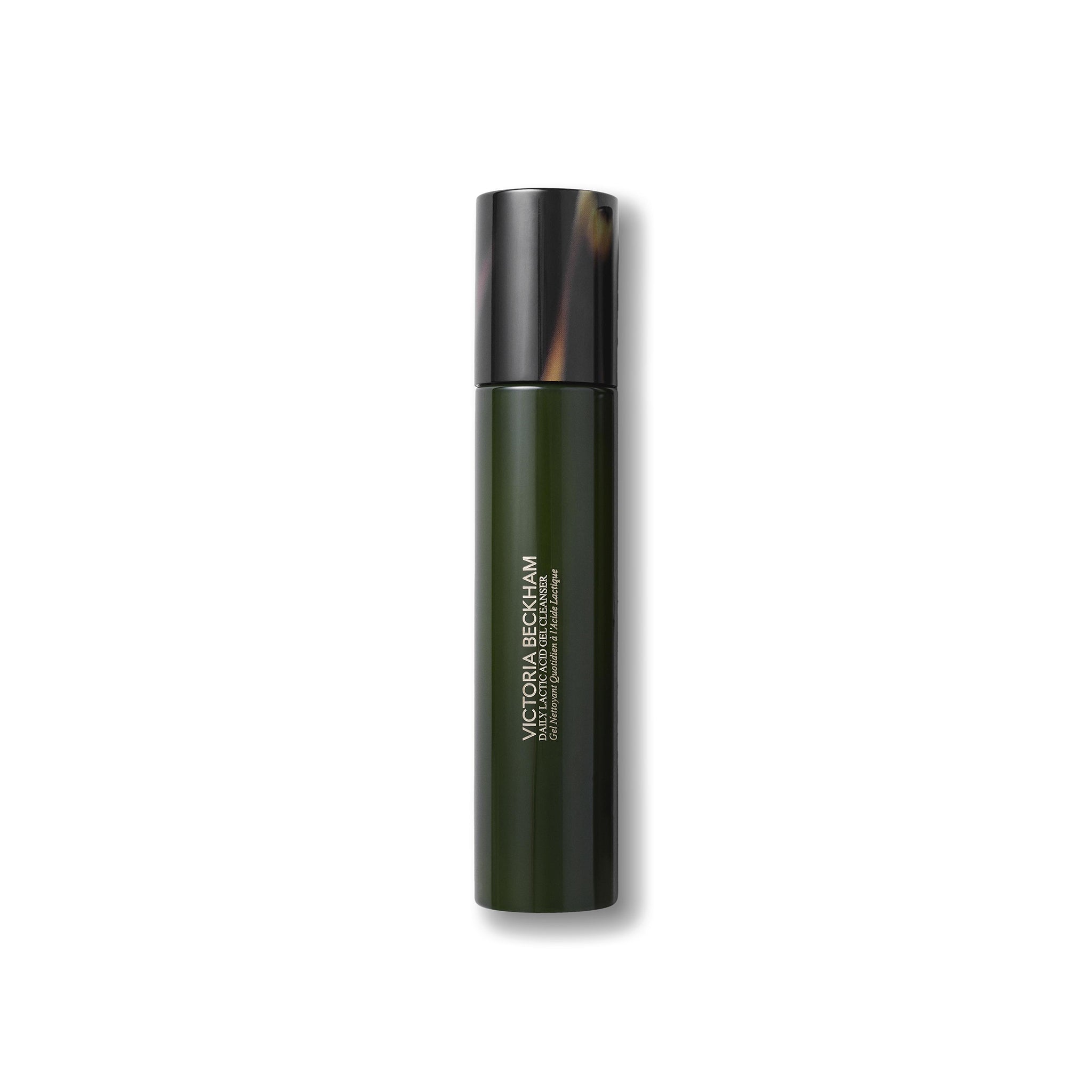 Green bottle with tortoiseshell cap on a white background