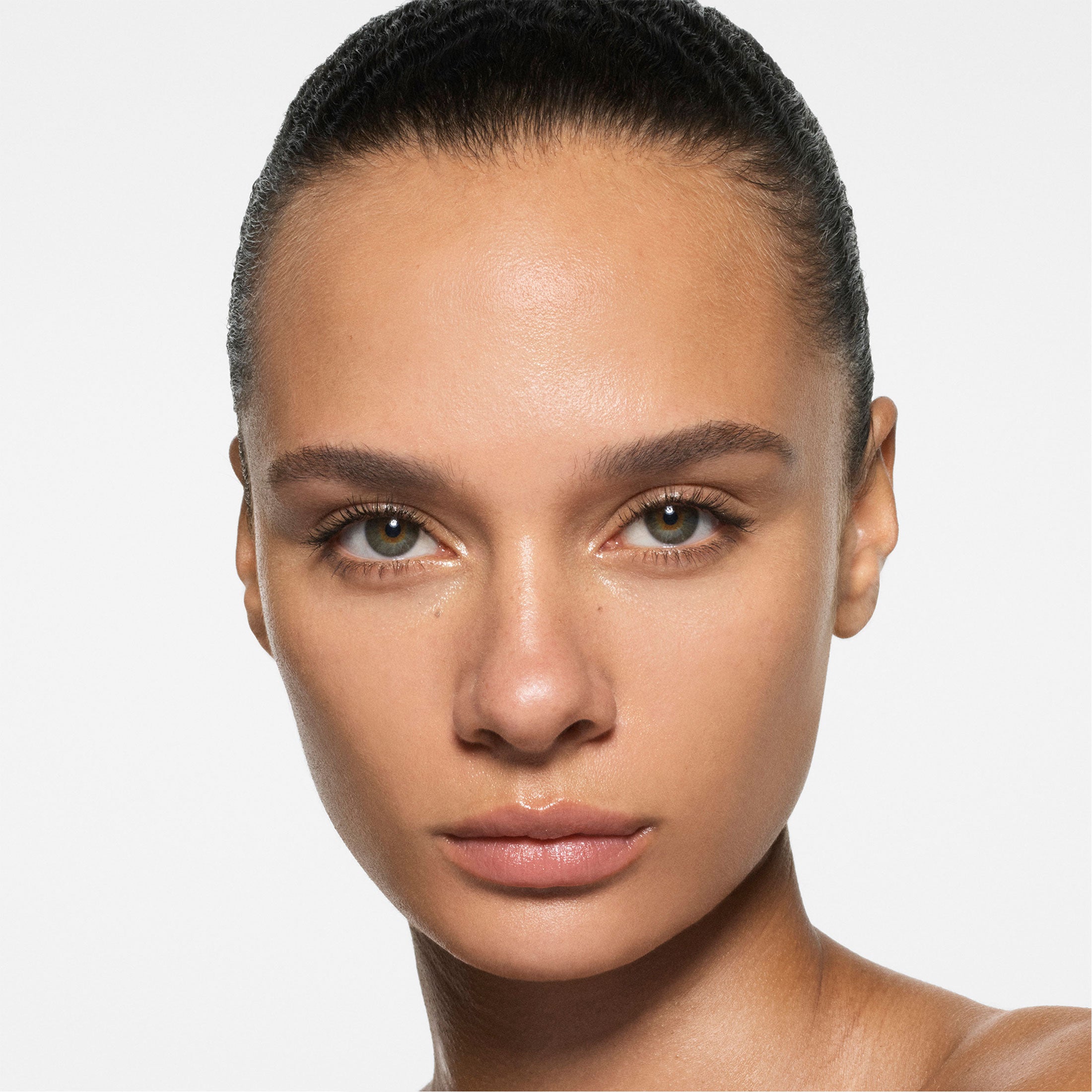 Close-up of a person with a neutral background