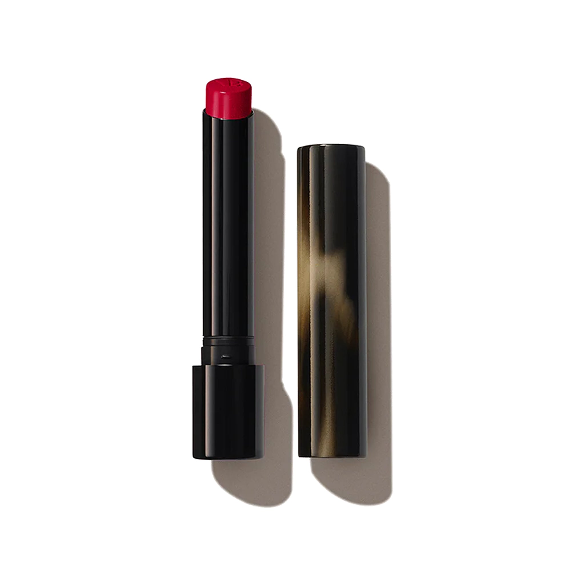 Lipstick with red shade and black casing on a white background