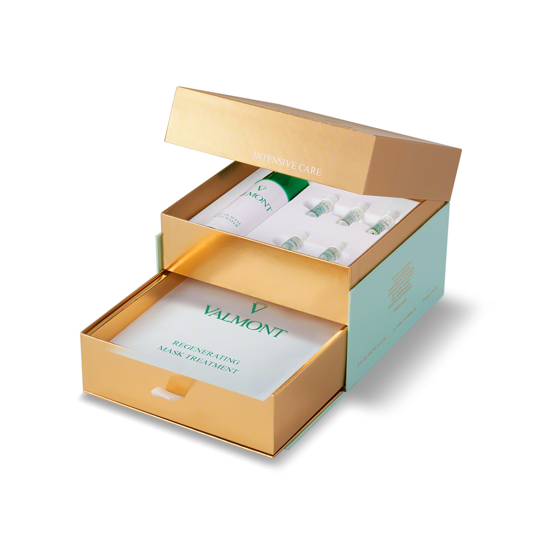 Valmont skincare products in an open gold and green box on a white background