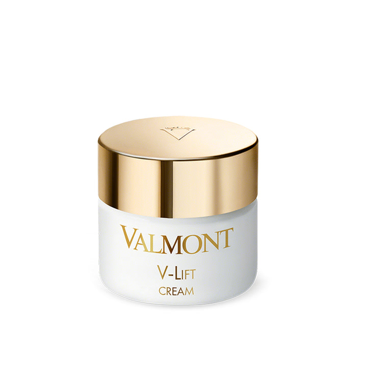 A jar of Valmont V-Lift Cream with a white body and a gold-colored lid.