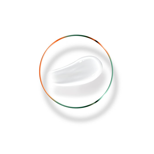 Close-up of a smooth cream texture on a white background