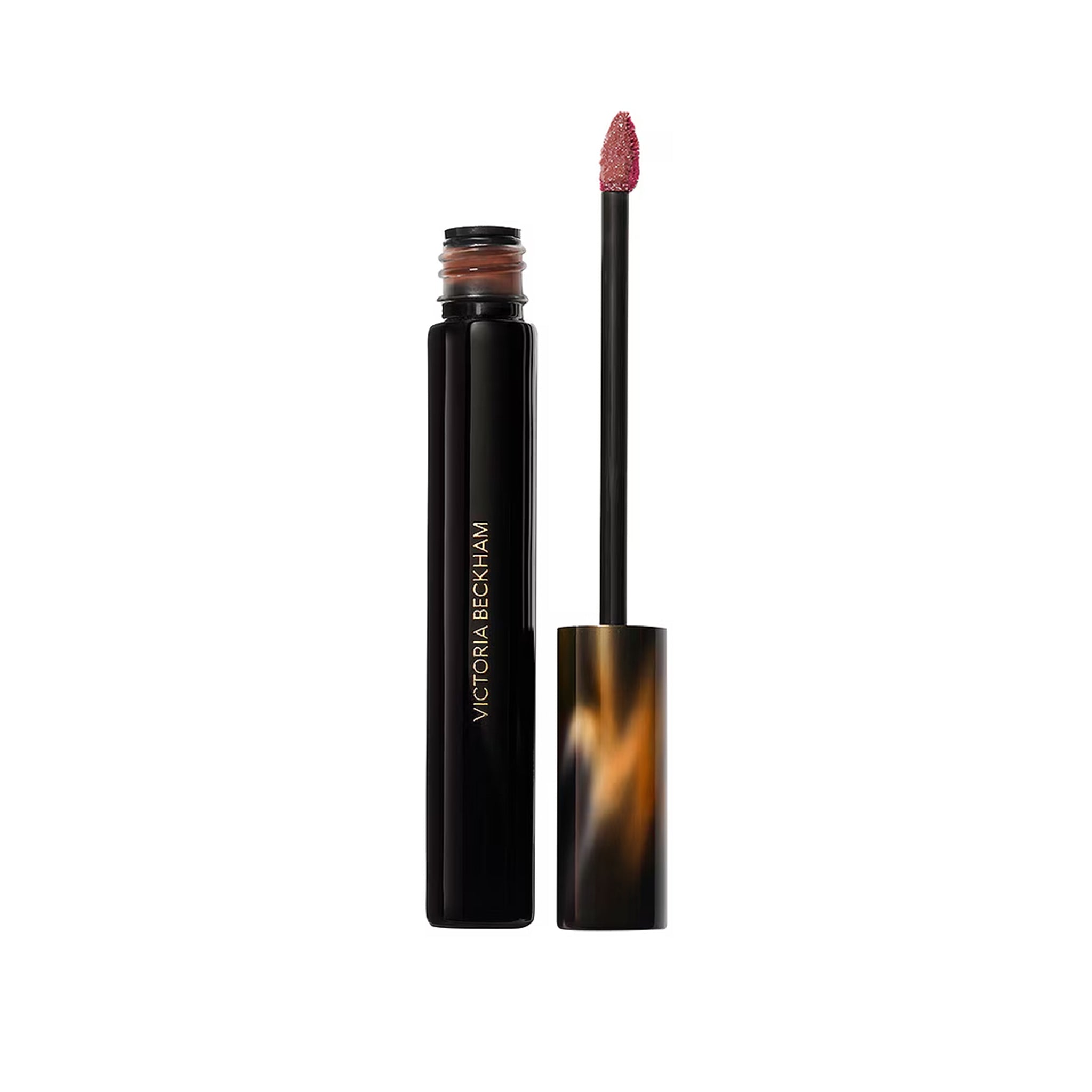 Victoria Beckham lip gloss with applicator on a white background