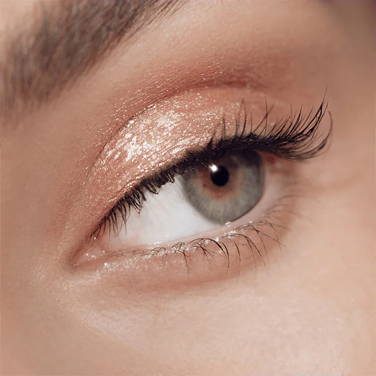 Shimmery eyeshadow on zoomed in eyelid