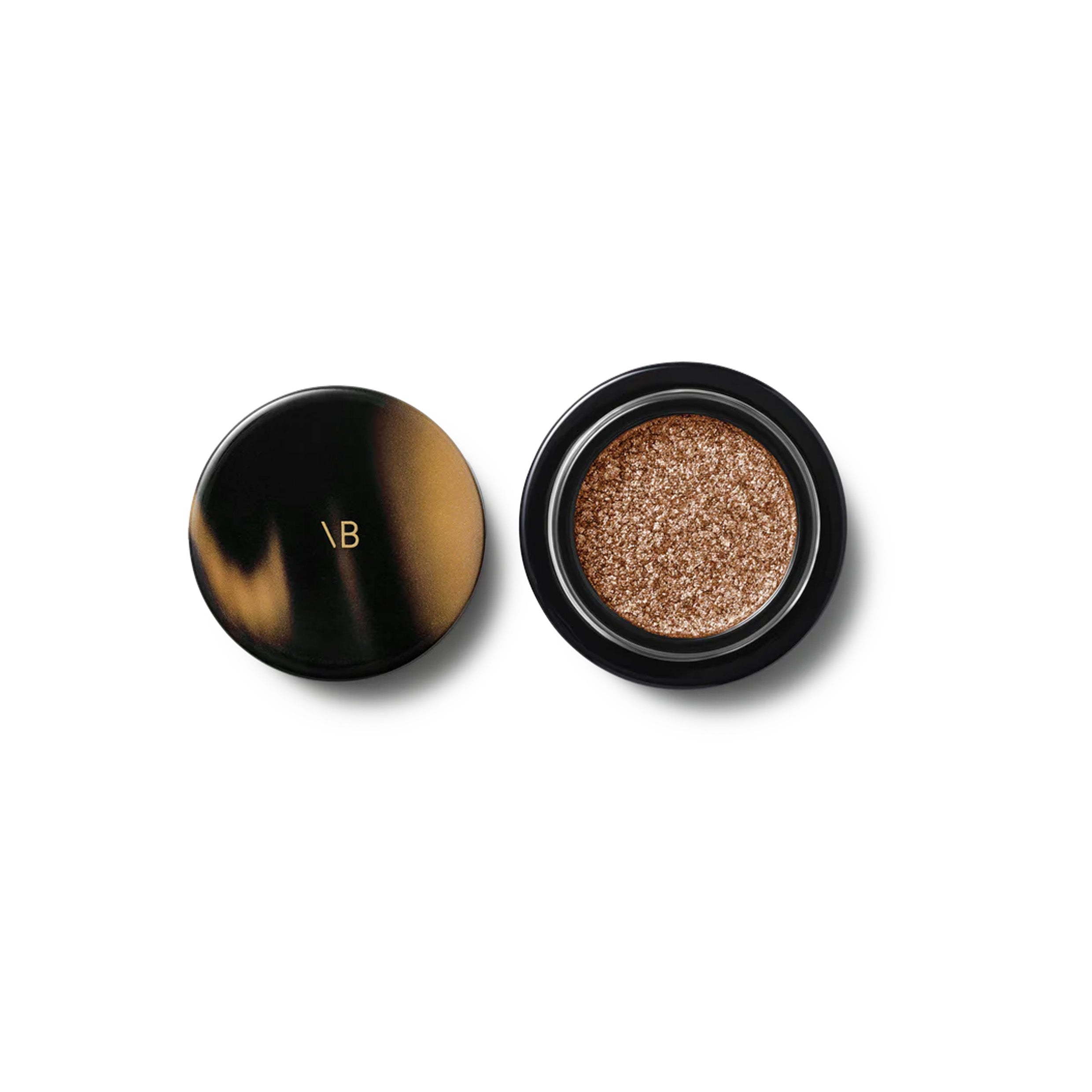 Shimmery eyeshadow product on plain background