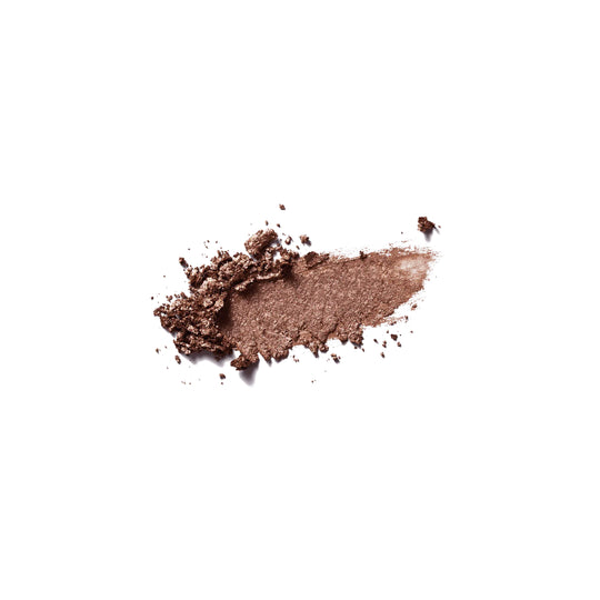 Shimmery rose gold eyeshadow swatch on plain background