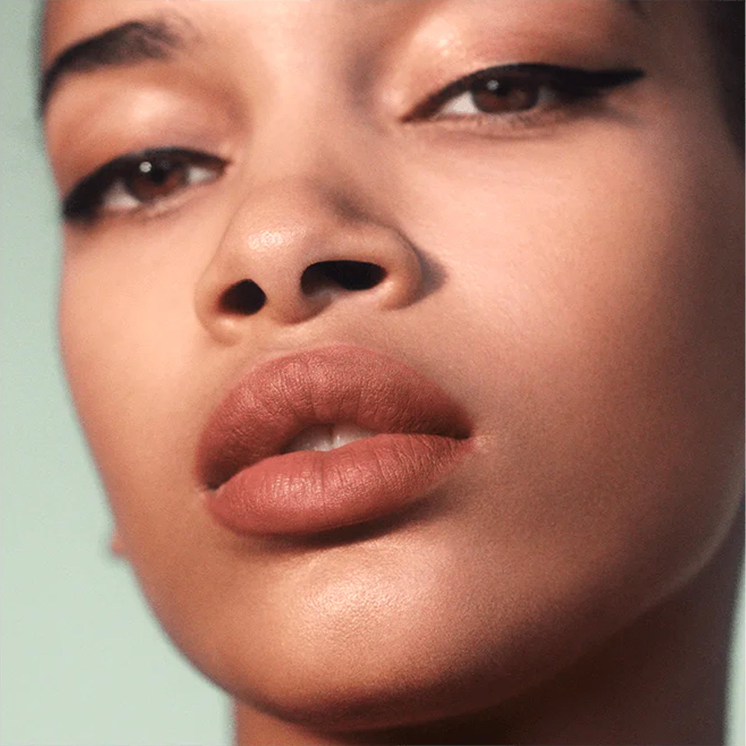 Model wearing lip pencil product