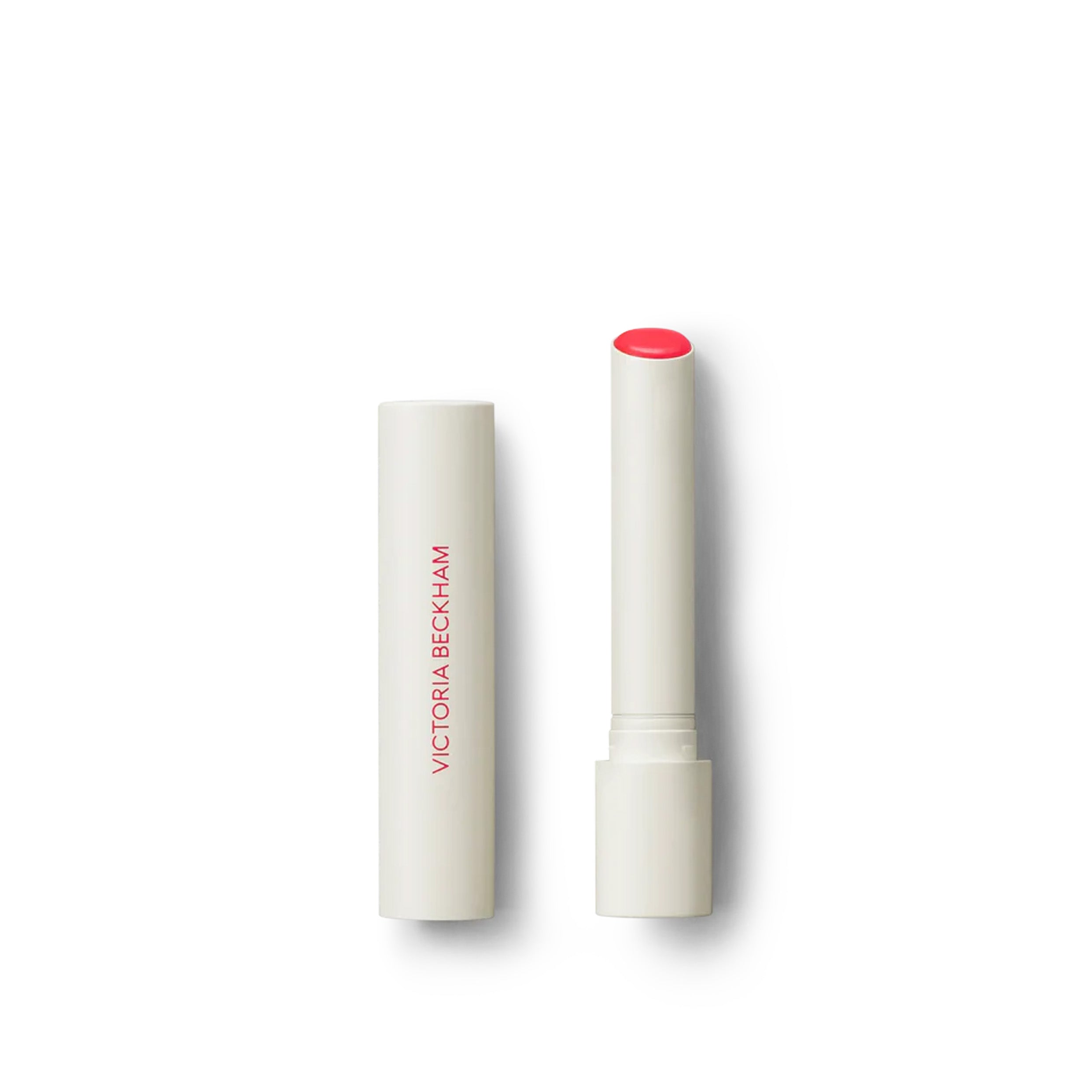 Victoria Beckham Beauty Posh Balm in Colette, a lip balm with a white bullet dispenser