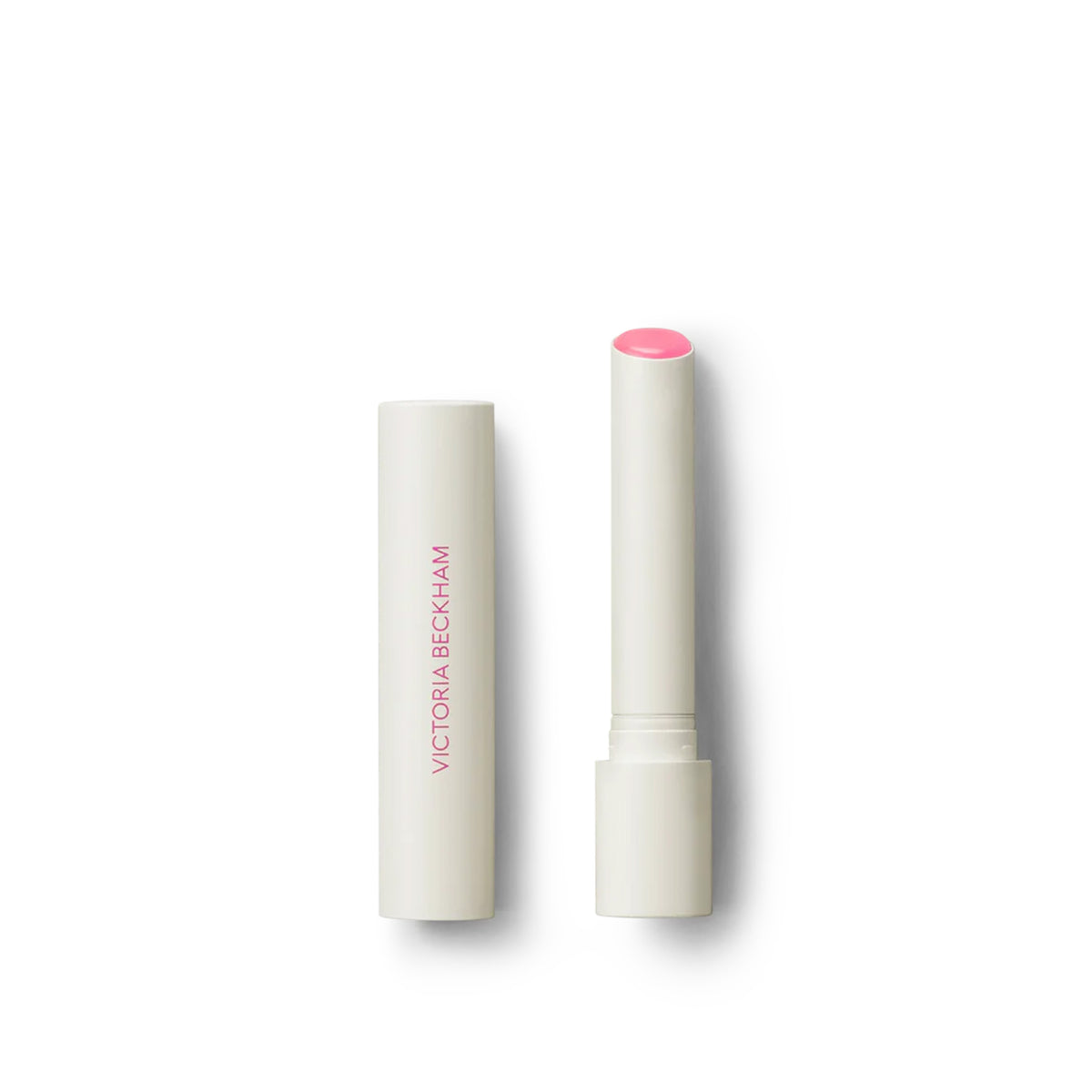 Victoria Beckham Beauty Posh Balm in Fleur, a lip balm with a white bullet dispenser