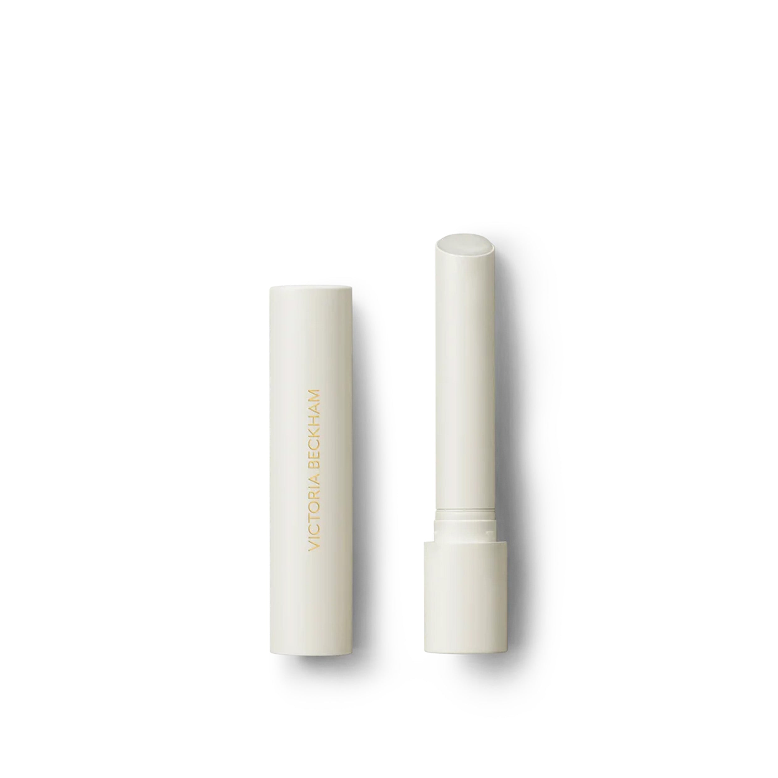 Victoria Beckham Beauty Posh Balm in Glace, a lip balm with a white bullet dispenser