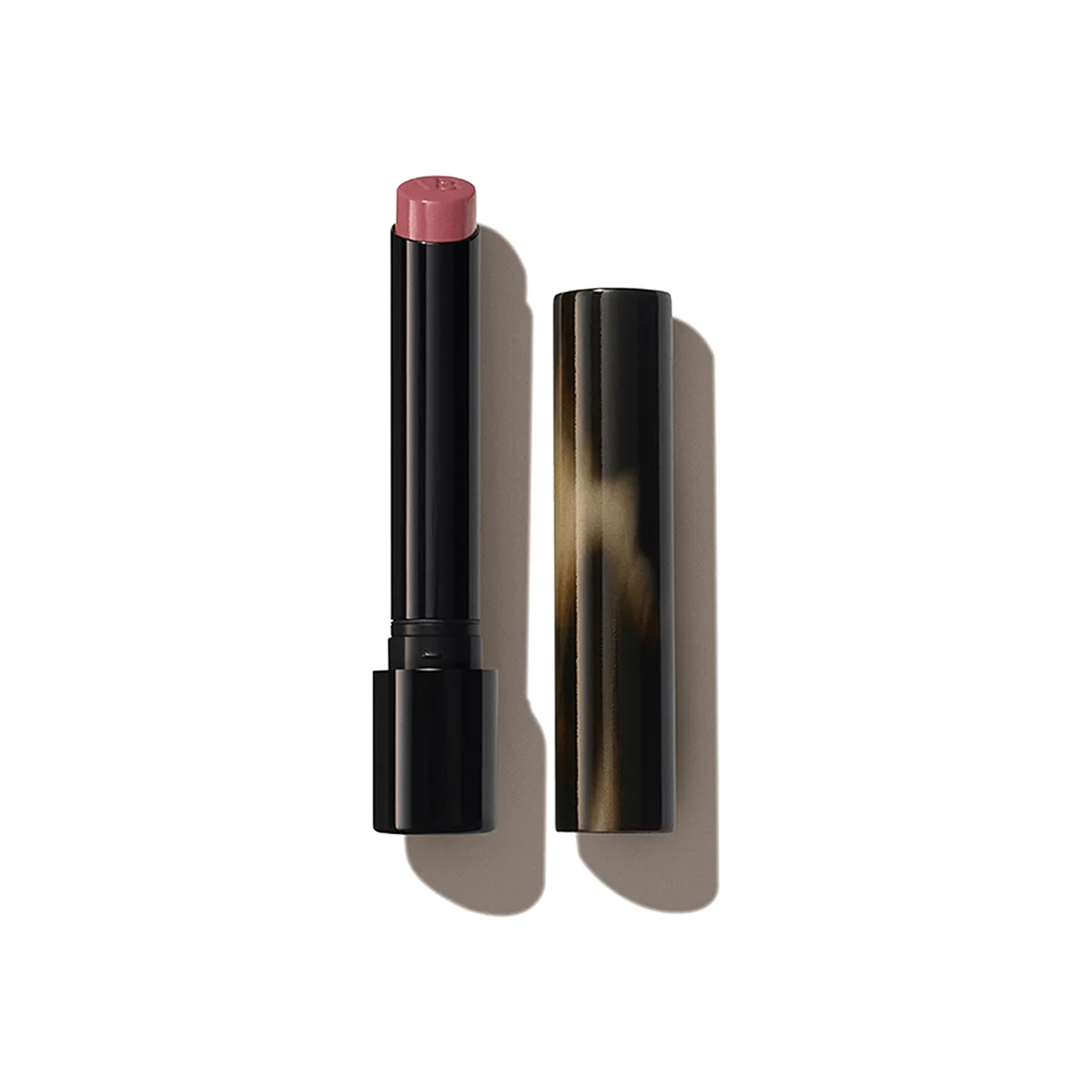 A Victoria Beckham Beauty Posh Lipstick in color 'Sway', a mid-tone berry pink, with the cap removed, displayed against a white background.
