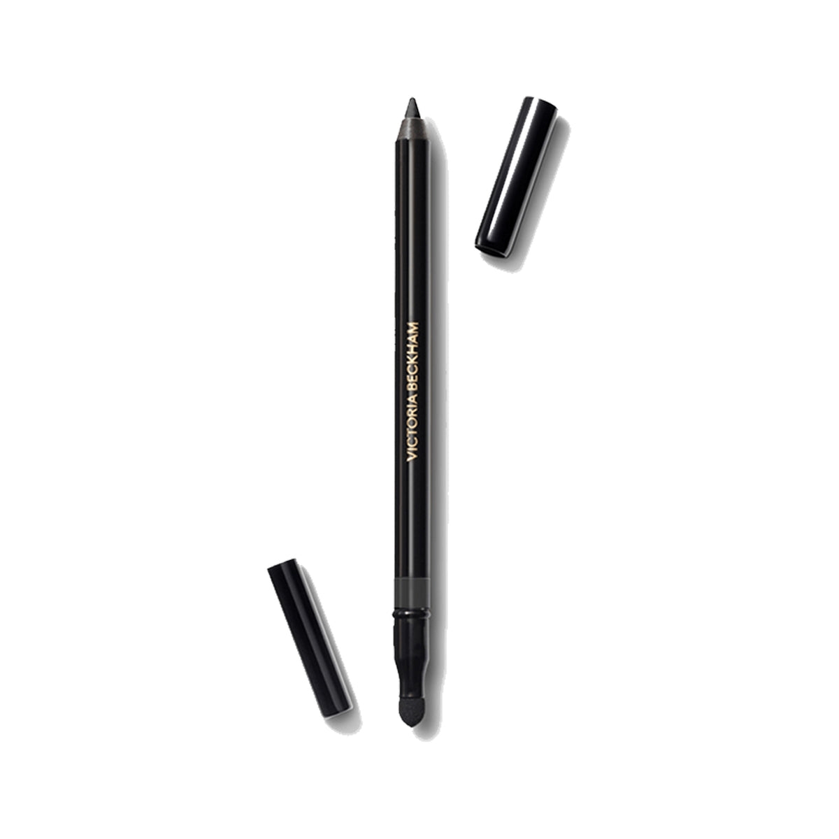 Victoria Beckham Beauty Satin Kajal Liner in Ash color, with the cap off, showing the rich matte graphite grey eyeliner pencil.
