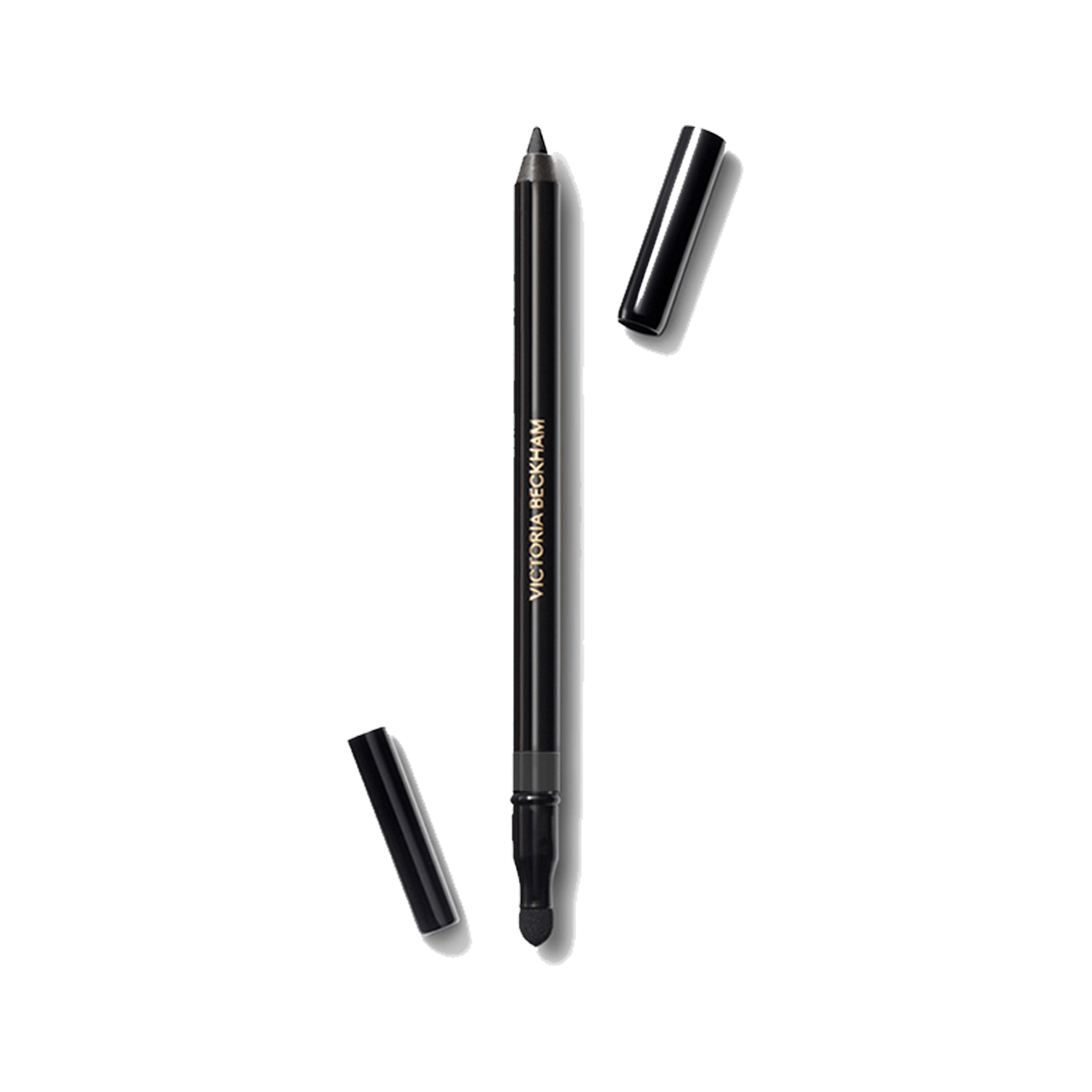 Victoria Beckham Beauty Satin Kajal Liner in Ash color, with the cap off, showing the rich matte graphite grey eyeliner pencil.