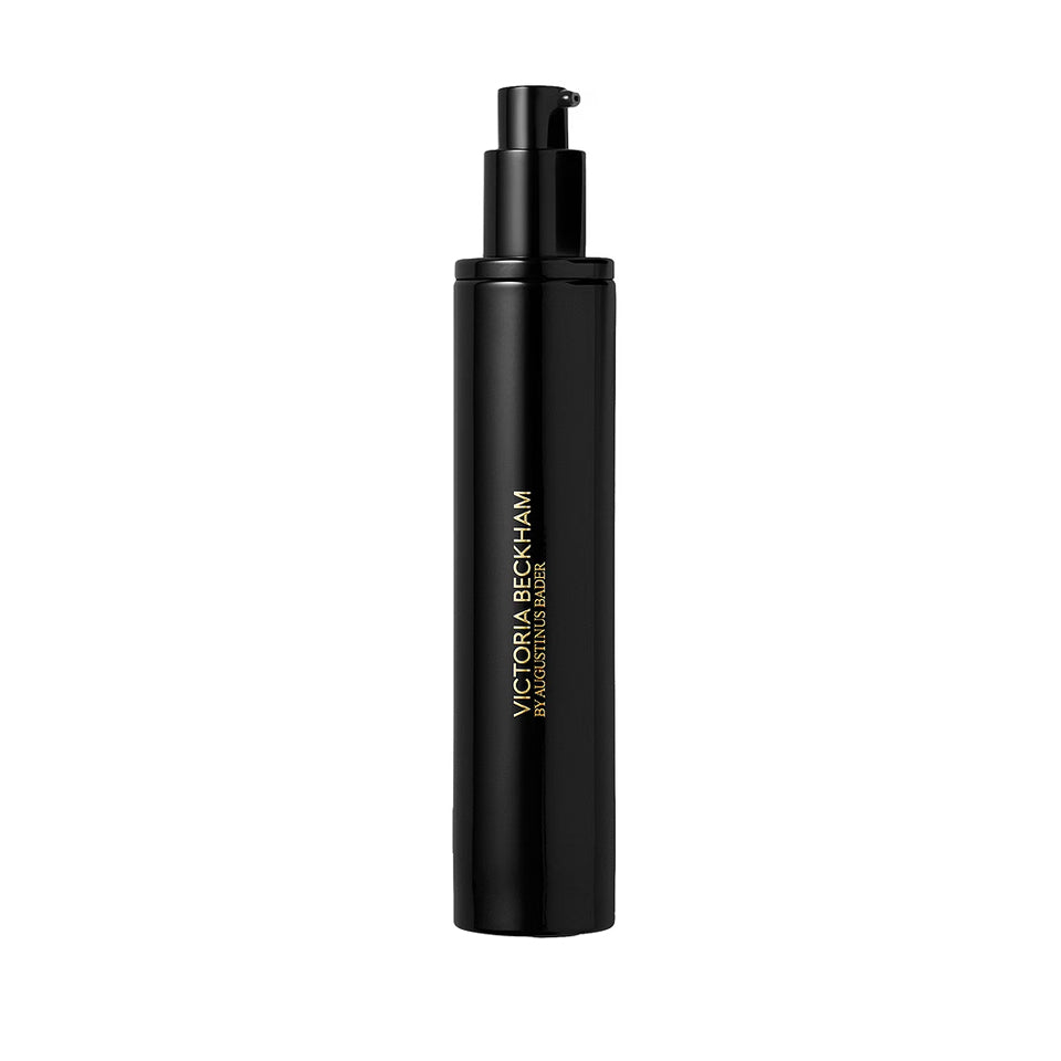 Black cosmetic bottle with Victoria Beckham branding on a white background